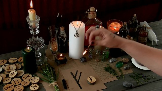 a woman performs a ritual, a witchcraft rite