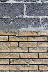 Wall cladding with decorative bricks, front view. Material for decorating the wall of house or fence