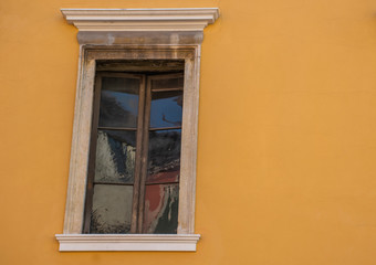 Window on ocher wall