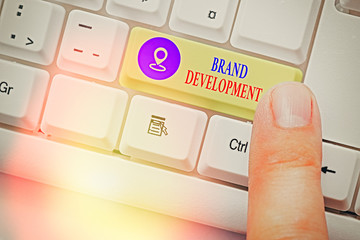 Conceptual hand writing showing Brand Development. Concept meaning Defining the product to excel in...