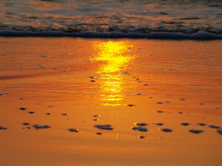 Horizontal shot of a beautiful sea sunset without clouds, orange sky. For backgrounds, templates, flyers, backdrops