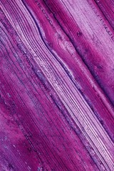 Wood texture toned in violet color. Diagonal boards close-up. Lilac wooden background vertical. Phone screensaver template