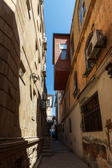Azerbaijan, Baku, Icheri Sheher streets of the old city, color and ordinary life of citizens. Balconies, alleys, terraces, narrow walkways