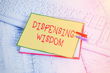 Writing note showing Dispensing Wisdom. Business concept for Giving intellectual facts on variety...