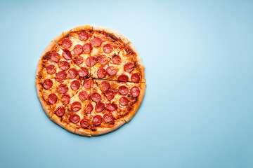 Sliced pizza flat lay. Hot pepperoni pizza