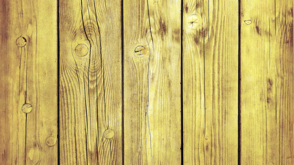 Yellow background wooden planks board texture.