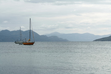 View of sailing boats, from the island of Aegina, in the bay of Saronicos.