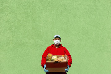 man with a box of food, help and donation of food