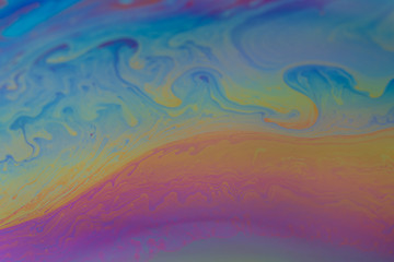 abstract background iridescent paint, colors iridescent interference rainbow on a soap bubble