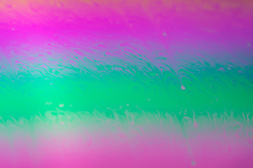 Obraz na płótnie Canvas Psychedelic background surface of colorful soap bubble