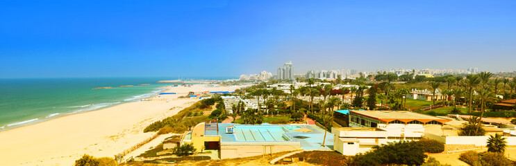 Mediterranean sea and beach on a sunny day in Ashkelon, Israel. Panorama. Banner