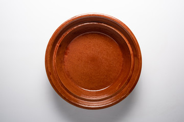 Empty clay plate top view