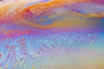 abstract background iridescent paint, colors iridescent interference rainbow on a soap bubble