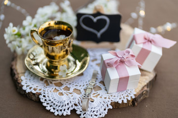 A small box with jewelry. Charm bracelet. Best gift for Valentines Day and Mothers day.