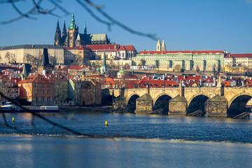 View of the Vltava River and the bridges shined with the sunset sun, Prague