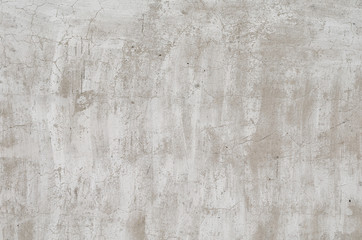 old concrete wall with paint residues close up