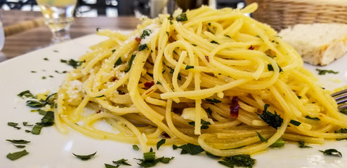 spaghetti with herbs and parmesan cheese
