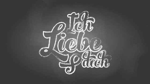 german i love you ich liebe dich written with chalk using curly typography over a black chalkboard suggesting message left by lover