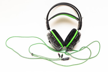 Computer headphones on a white background.A device for listening to audio recordings.