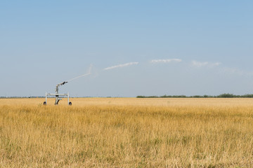 Irrigation system working on a field