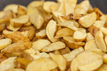 Close up photo of french fried potatoes. Grilled tasty vegetables