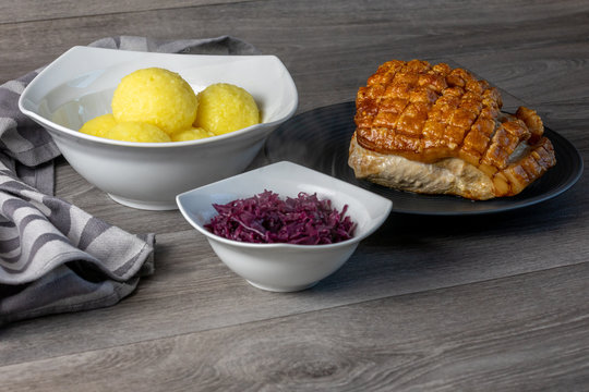 Fine Meat - Pork Roast With Crackle,  Potato Dumpling And Red Cabbage