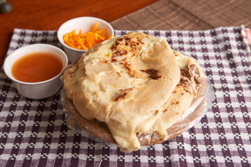 Close up photo of pupusas dish with nuegados, a traditional meal from El Salvador
