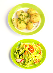 Young  boiled potatoes with dill and vegetable salad isolated on white background,photo