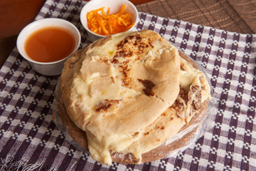 Close up photo of pupusas dish with nuegados, a traditional meal from El Salvador