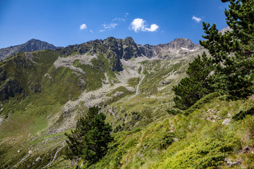 Fototapeta premium Beautiful mountains, blue sky, mountain landscape, rocks, waterfall.