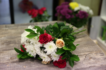 bouquet of flowers on a table in a flower shop