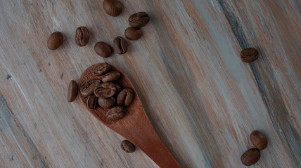 coffee beans on wooden background