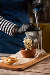 cooking minced meat for fish cutlets with ingredients on a table with a meat grinder. Fillet of fish. Dish, main dish. Fasting food seasoning. Mincing Fish. Making Fish .