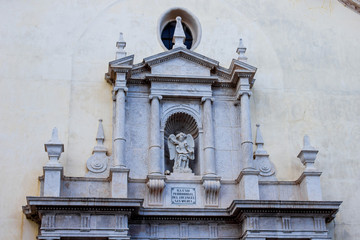 sculpture spanish old church facade, background with architectural elements