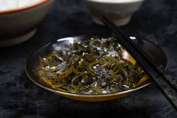 Seaweed and sesame seeds on plate