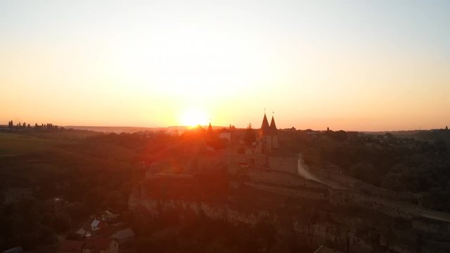 Sunset behind Kamianets Podilsyi Castle in Ukraine