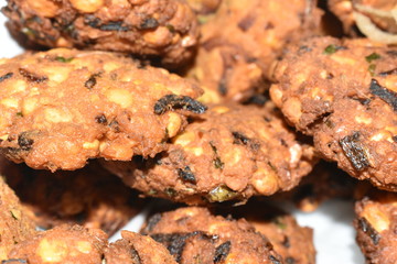 Parippuvada, a snack made with dhal and vegetables