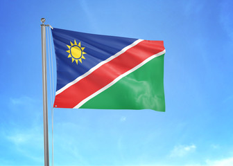 Fototapeta na wymiar Namibia flag waving sky background 3D illustration