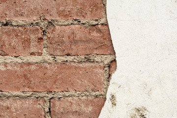 red brick wall and half-ruined white stucco, architecture abstract background