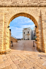 Stone Arch and Traditional Apulian Building At Sunet - Monopoli - Apulia - Italy