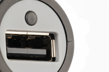 macro photography of a car lighter charger with usb socket