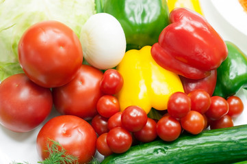 Various fresh vegetables for salad preparation, close-up