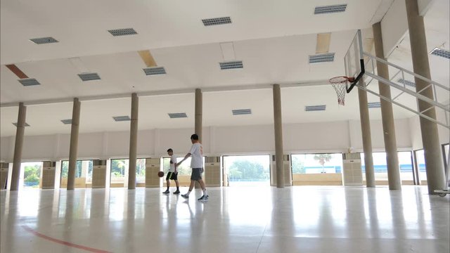 Father and son playing basketball, Time Lapse.