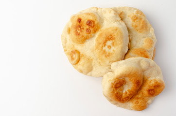 Navajo fried bread isolated on white