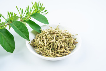 Dried honeysuckle and fresh honeysuckle buds