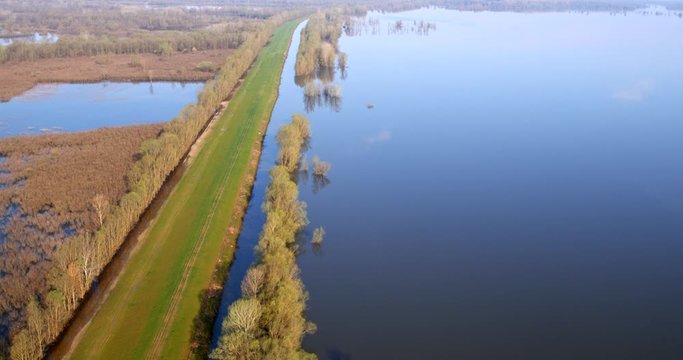 Aerial footage of flooded floodplain with dikes in Lonjsko polje, Croatia