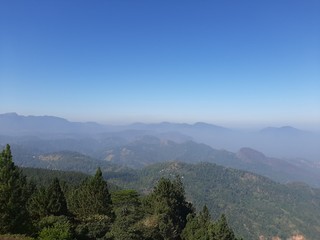 Naklejka premium mountain landscape with fog