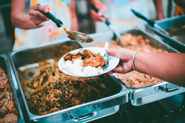 Food donation to relieve hunger. The concept of poverty