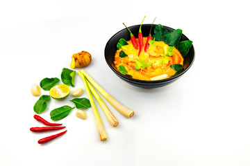 Thai Famous Hot and Spicy Soup "Tom Yum Goong" with Herbal Ingredients background