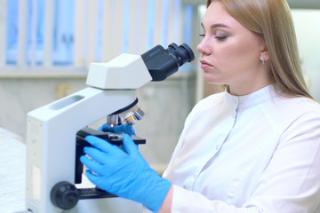Fototapeta premium A group of scientists conducts research in a scientific laborato
